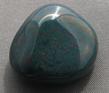 this is a photo of bloodstone, a green and red jasper from India and used for crystal healing