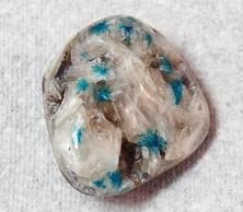 Photo of tumbled cavansite, a zeolite from India