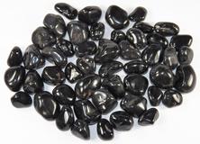 photo of tumbled black onyx from brazil size small to medium metaphysical crytal healing stone for reiki wicca pagan hippie