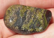 This is a photo of tumbled african bloodstone from western australia, not africa and metaphysically is used to detoxify organs and purify one's blood