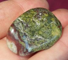 This is a photo of tumbled african bloodstone from western australia, not africa and metaphysically is used to detoxify organs and purify one's blood
