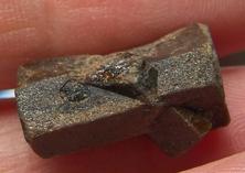 Photo of Staurolite specimen crystal from Madagascar also called Fairy Cross and used to help one to give up self-destructive habits and brings one closer to animals