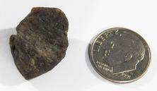 Photo of darwin glass meteorite from Tasmania similar to moldavite metaphysical crystal