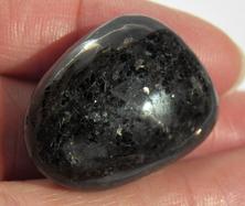 Photo of tumbled Nuummite from Greenland