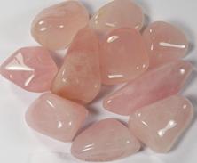 Photo of tumbled rose quartz from Madagascar, a stone of love, a pink ray of LOVE stone