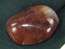 photo of spessartine garnet tumbled stone from Mwakaijembe in the Umba River Valley, Tanzania