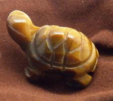 photo of carved turtle made of gold tiger eye from south africa