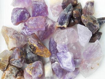 photo of amethyst from bolivia, brazil, india, madagascar, and mozambique rough rock for tumbling tumbler crystals