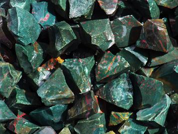 Photo of bloodstone, rough tumbling rock from india
