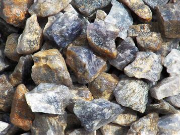 Photo of iolite, rough tumbling rock, india