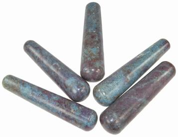 photo of five massage wands made of the gemstone ruby in kyanite from tanzania