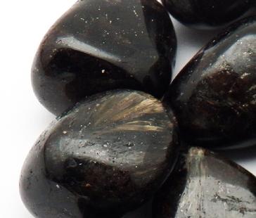 Photo of tumbled arfvedsonite from kola peninsula, russia