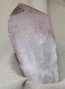 Hematite coated quartz, called hematoid or ferruginous or PURPLE TOP